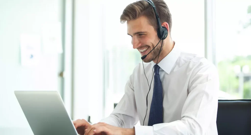 A man working as a customer support agent.